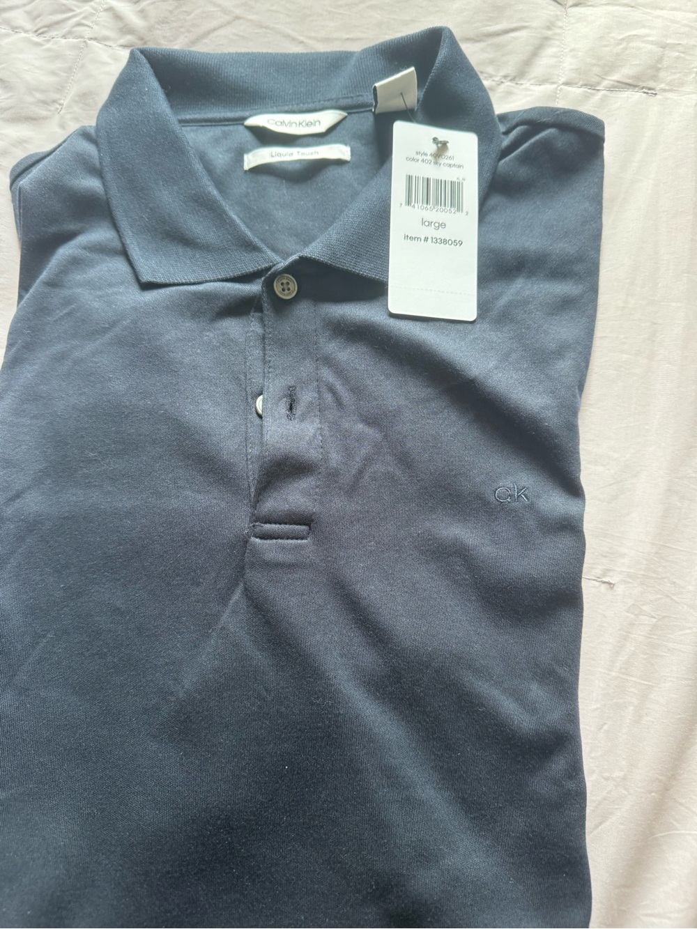 Calvin Klein Men's Dark Blue Polo Shirt with CK Logo